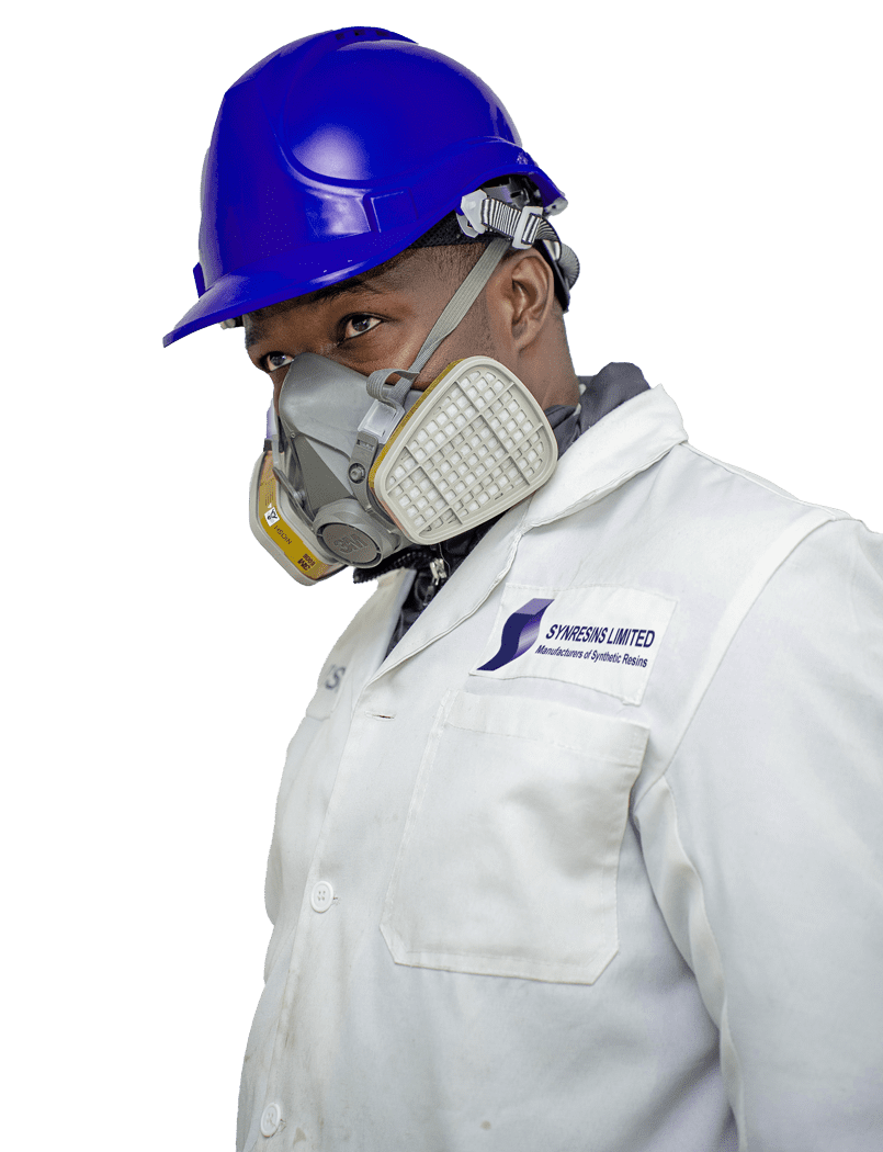 Worker in chemical-resistant mask and blue hard hat at Synresins Limited